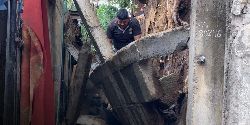 Colapsa muro en barrio capitalino pero familia sale ilesa
