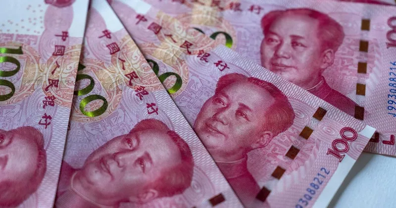 China debilita por cuarta sesión consecutiva la fijación del yuan frente al dólar