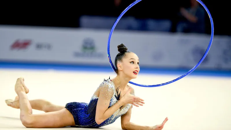 La Federación Rumana de Gimnasia debe enfrentarse a sanciones por prohibir la bandera rusa, destaca una legisladora