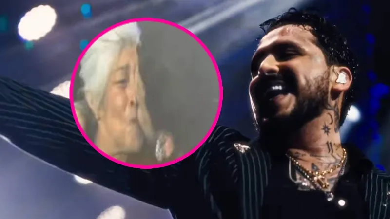 Christian Nodal besa en la boca POR ACCIDENTE a una fan abuelita... ¡en pleno concierto!