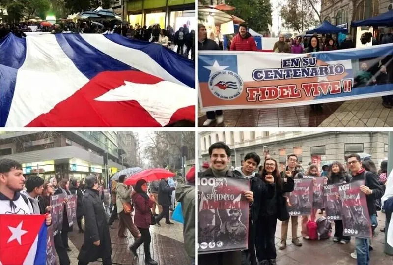 Bajo la lluvia chilenos marcharon en Santiago en homenaje a Fidel