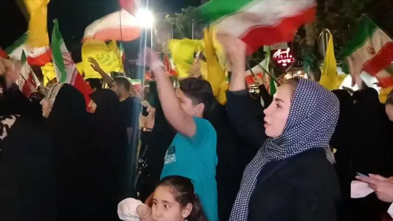 Iraníes ondean bandera de Hezbolá en señal de apoyo; Líbano es como su país