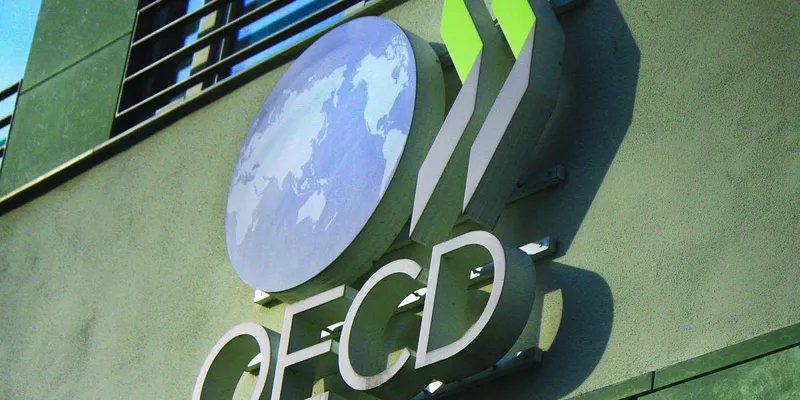 La OCDE dice que el impuesto mínimo global ha elevado los ingresos, sin pérdidas de empleo